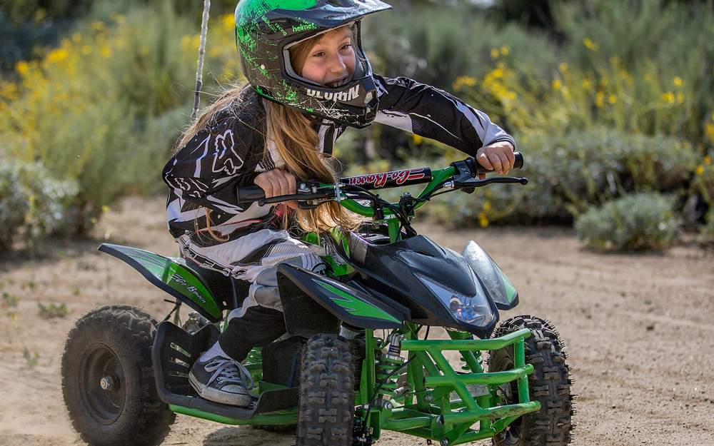 Vincent Dodd riding an ATV.