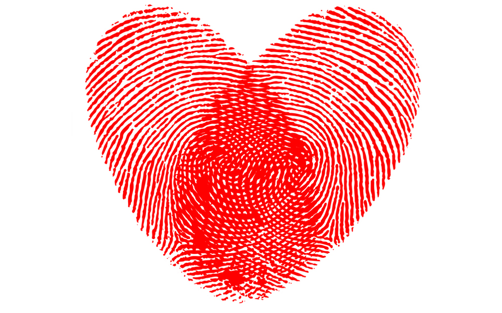Two fingerprints creating the shape of a heart.
