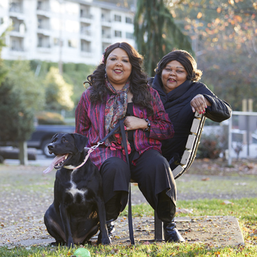 Ricki and Cynthia Nero with their dog Layla.
