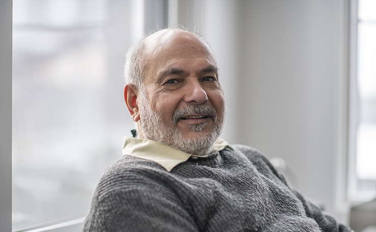 Older gentleman sitting by a window